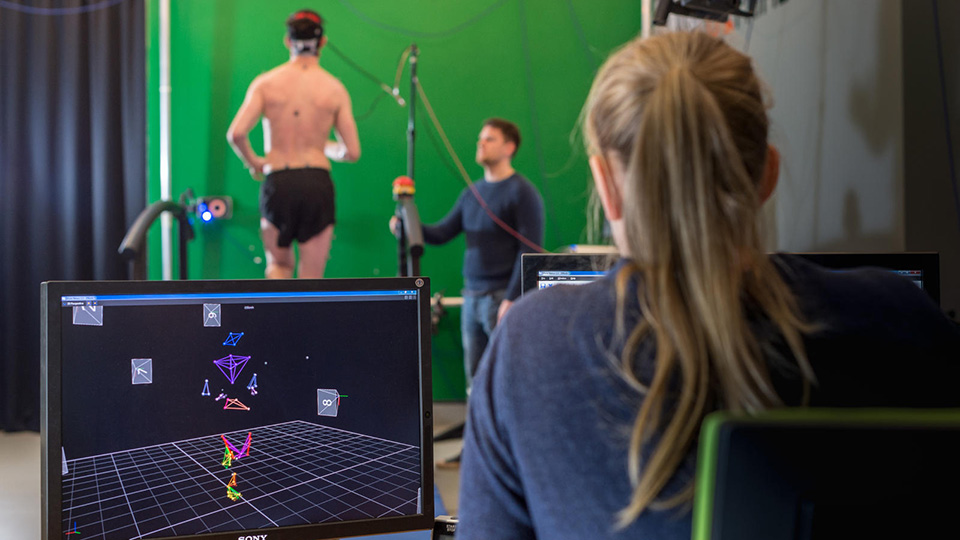 PG student analysing the biomechanics of an athlete